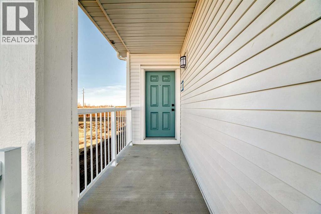 81 Southborough Square, Cochrane, Alberta  T4C 3J7 - Photo 3 - A2260500