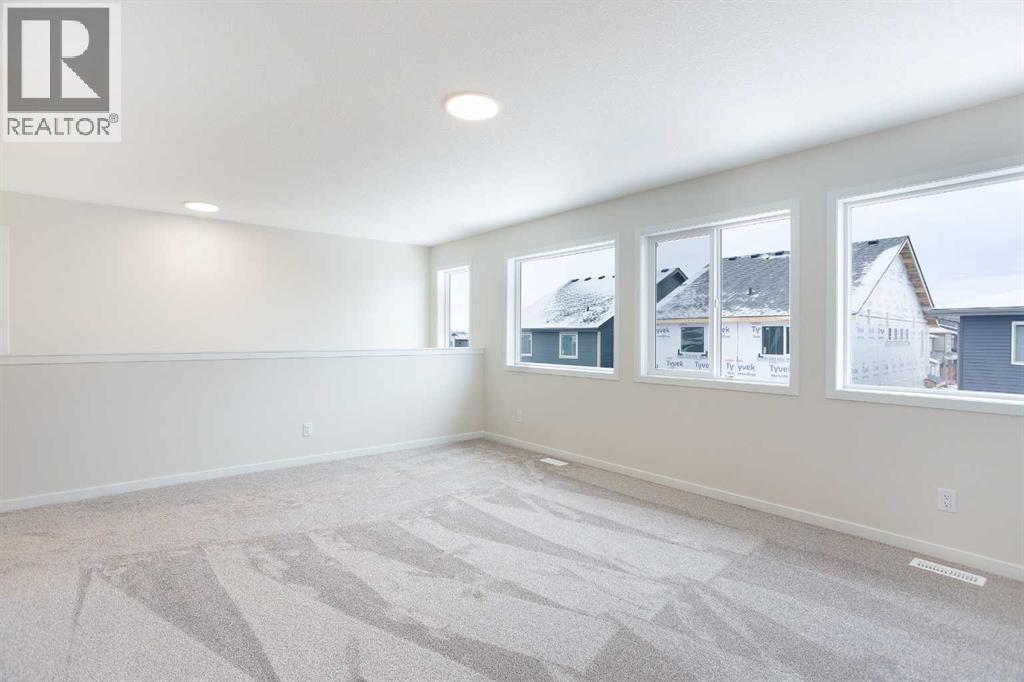 53 Creekside Passage Sw, Calgary, Alberta  T2X 5V6 - Photo 17 - A2279223