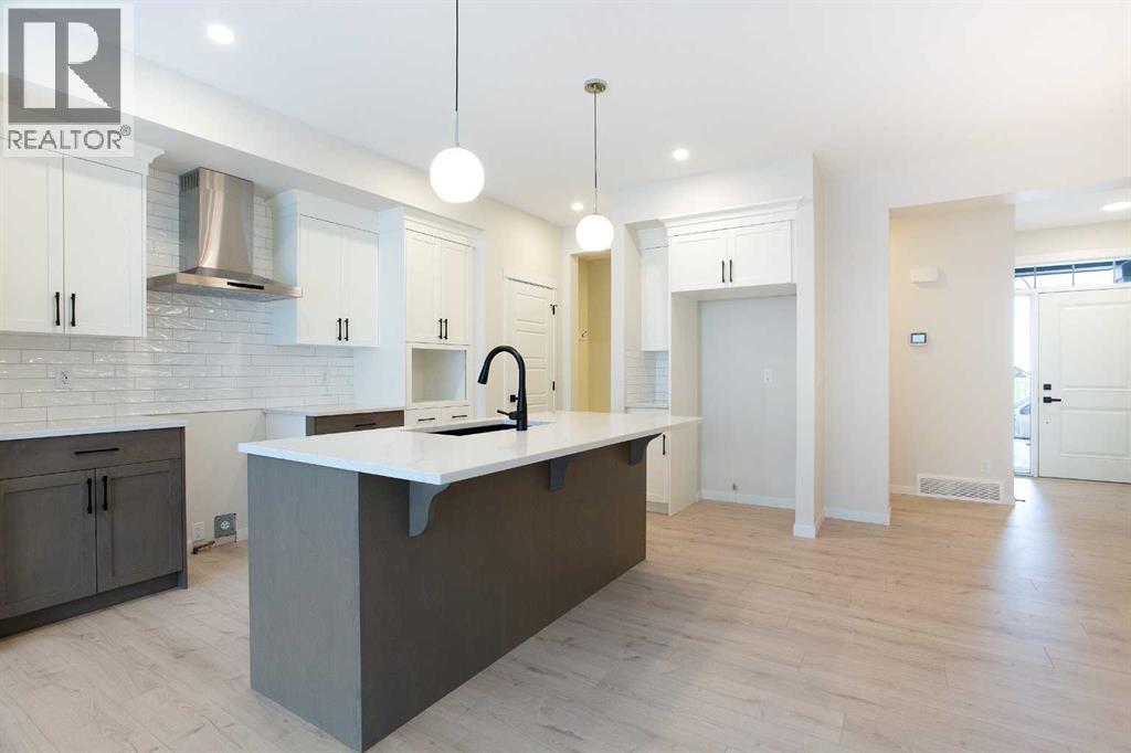 53 Creekside Passage Sw, Calgary, Alberta  T2X 5V6 - Photo 7 - A2279223