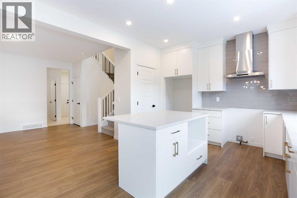 65 Creekside Passage Sw, Calgary, Alberta  T2X 5V6 - Photo 4 - A2279253