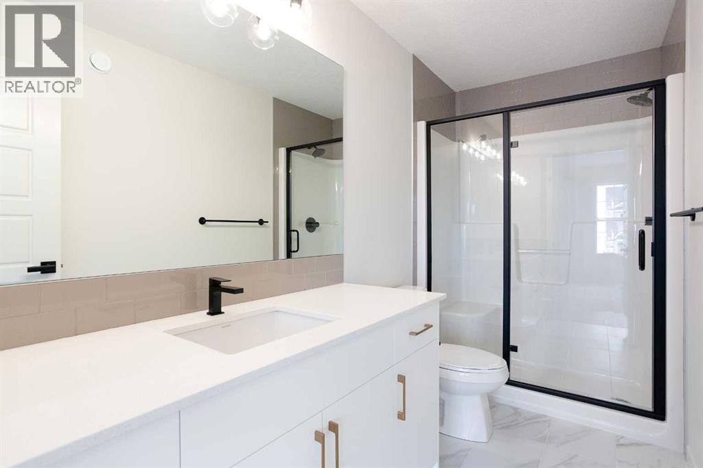 65 Creekside Passage Sw, Calgary, Alberta  T2X 5V6 - Photo 22 - A2279253