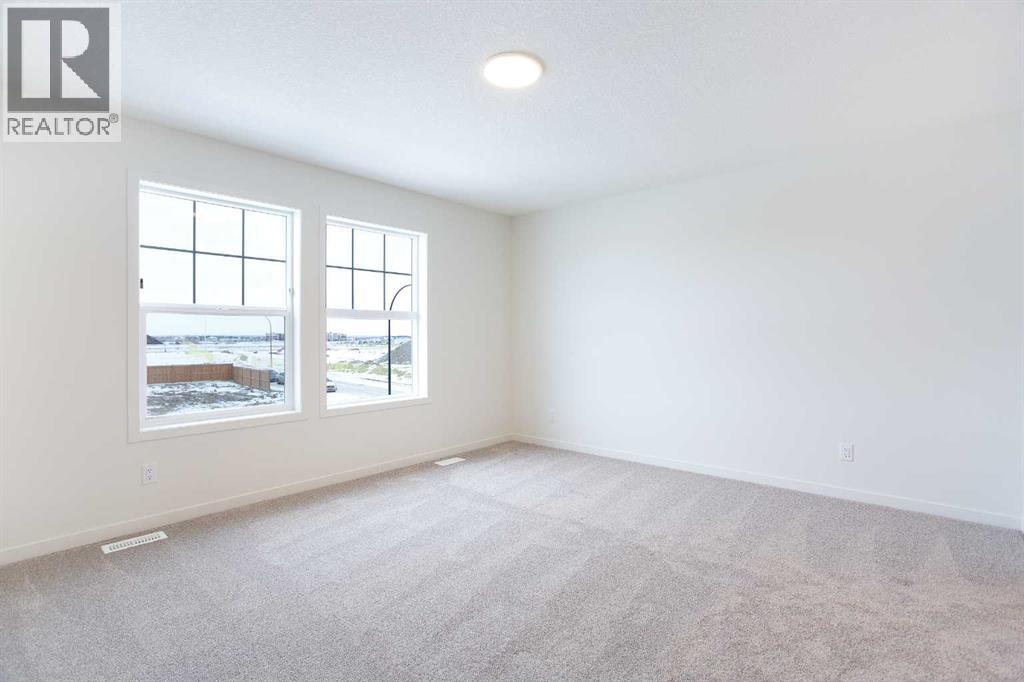 65 Creekside Passage Sw, Calgary, Alberta  T2X 5V6 - Photo 20 - A2279253