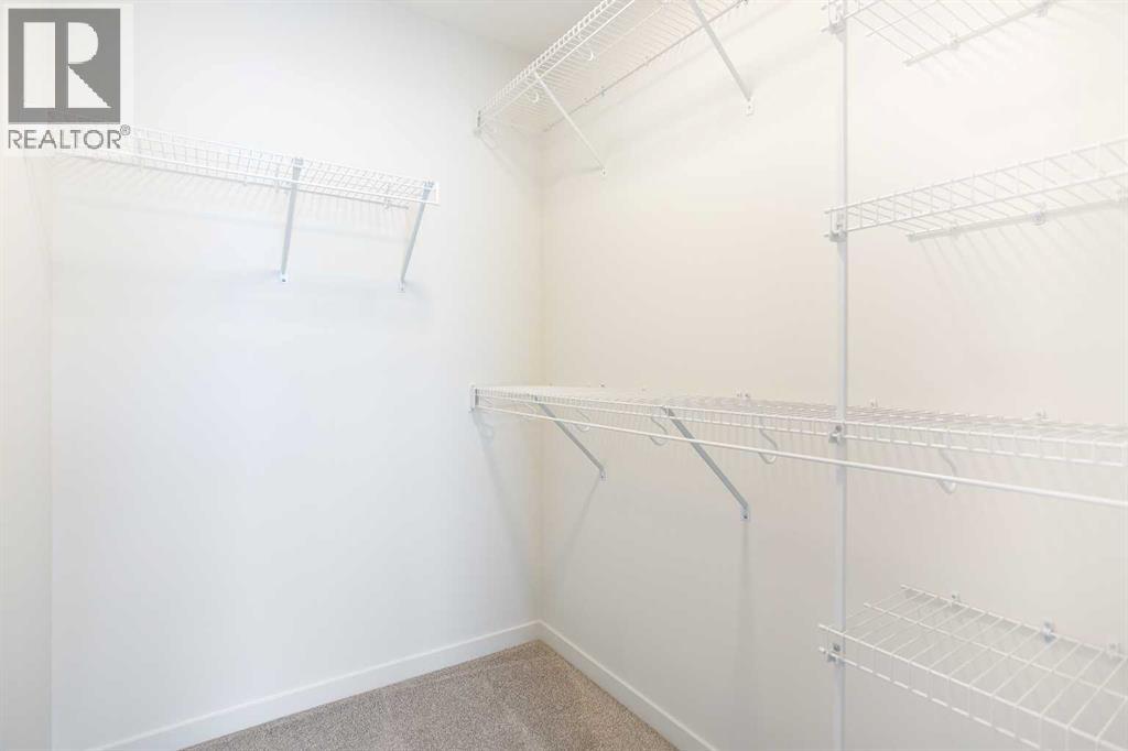 65 Creekside Passage Sw, Calgary, Alberta  T2X 5V6 - Photo 23 - A2279253