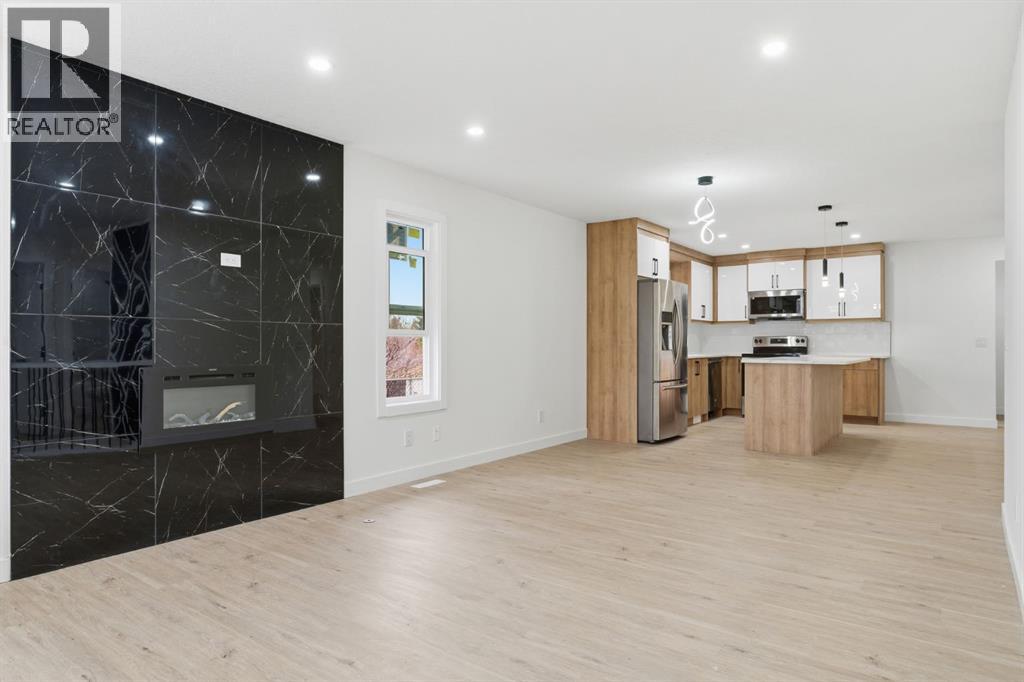 5 Del Monica Bay Ne, Calgary, Alberta  T1Y 6R2 - Photo 3 - A2267947