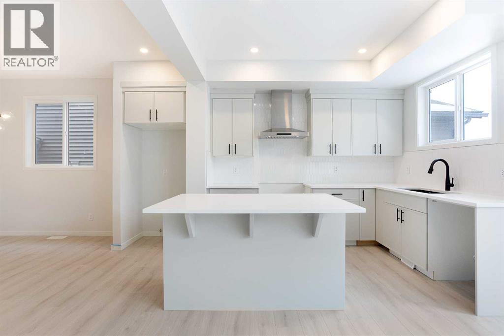 49 Creekside Passage Sw, Calgary, Alberta  T2X 5V6 - Photo 5 - A2279243