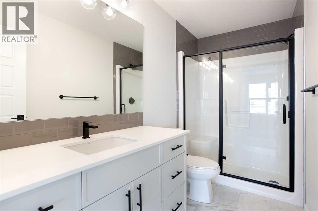 49 Creekside Passage Sw, Calgary, Alberta  T2X 5V6 - Photo 23 - A2279243