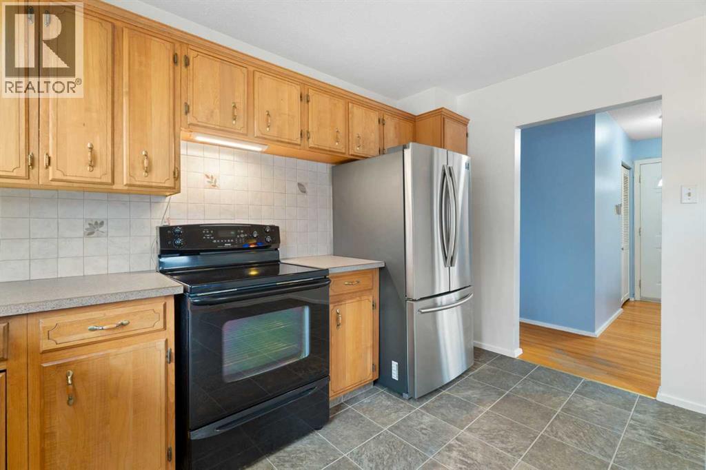 123 Glacier Drive Sw, Calgary, Alberta  T3E 5A3 - Photo 10 - A2271776