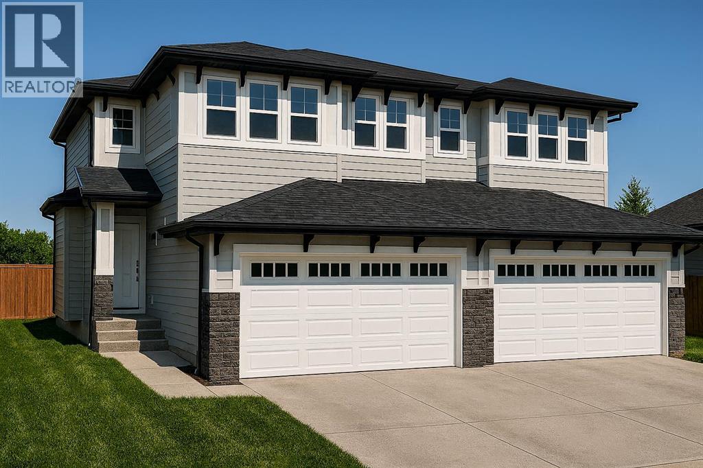 447 Kinniburgh Loop, Chestermere, Alberta  T1X 3C2 - Photo 1 - A2281154