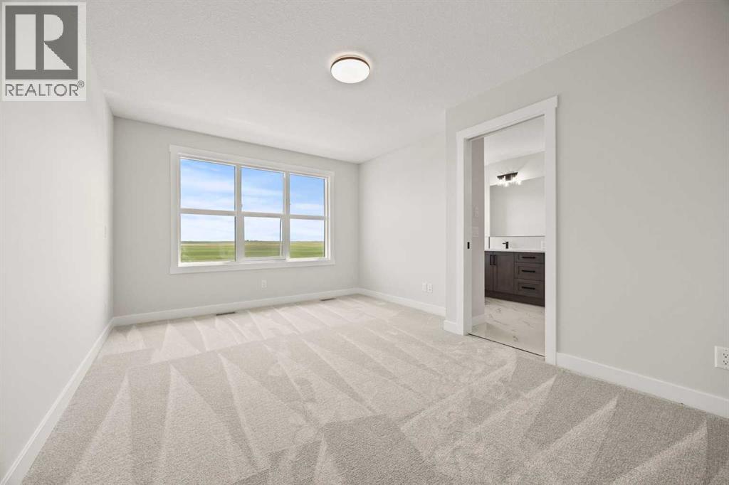 447 Kinniburgh Loop, Chestermere, Alberta  T1X 3C2 - Photo 34 - A2281154