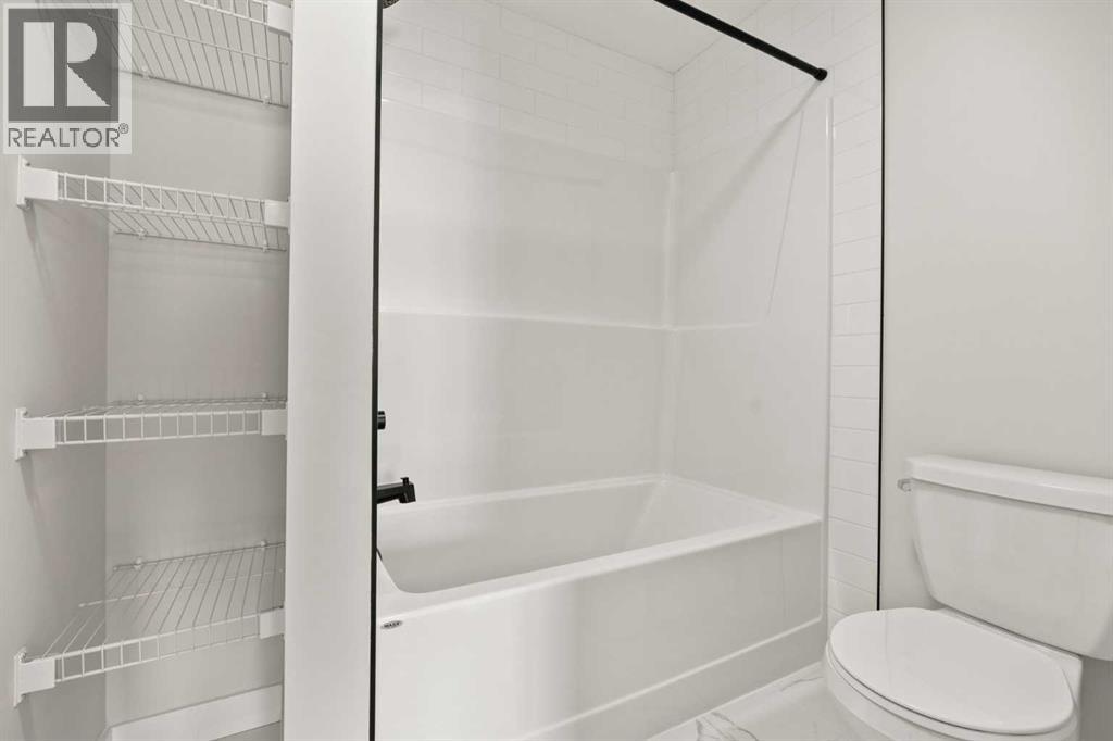 447 Kinniburgh Loop, Chestermere, Alberta  T1X 3C2 - Photo 31 - A2281154