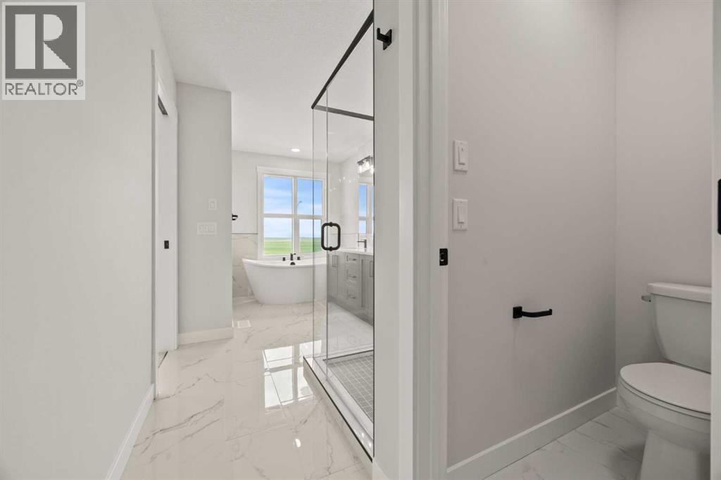 447 Kinniburgh Loop, Chestermere, Alberta  T1X 3C2 - Photo 41 - A2281154