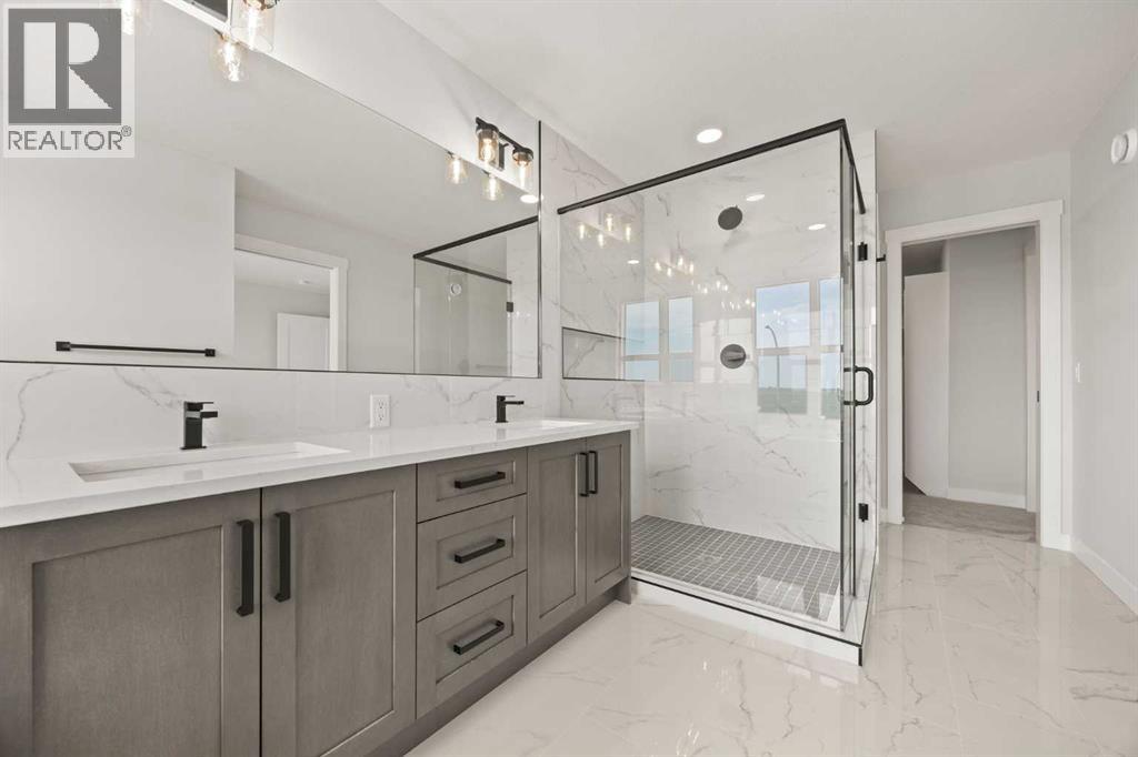 447 Kinniburgh Loop, Chestermere, Alberta  T1X 3C2 - Photo 38 - A2281154