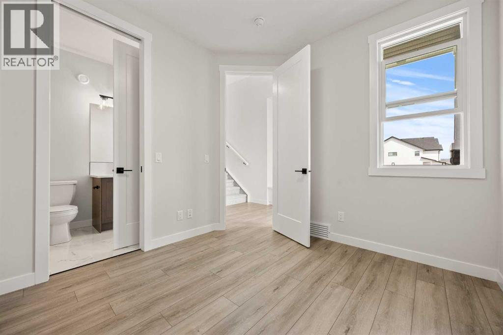 447 Kinniburgh Loop, Chestermere, Alberta  T1X 3C2 - Photo 6 - A2281154