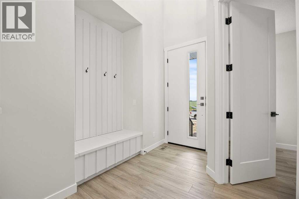 447 Kinniburgh Loop, Chestermere, Alberta  T1X 3C2 - Photo 2 - A2281154