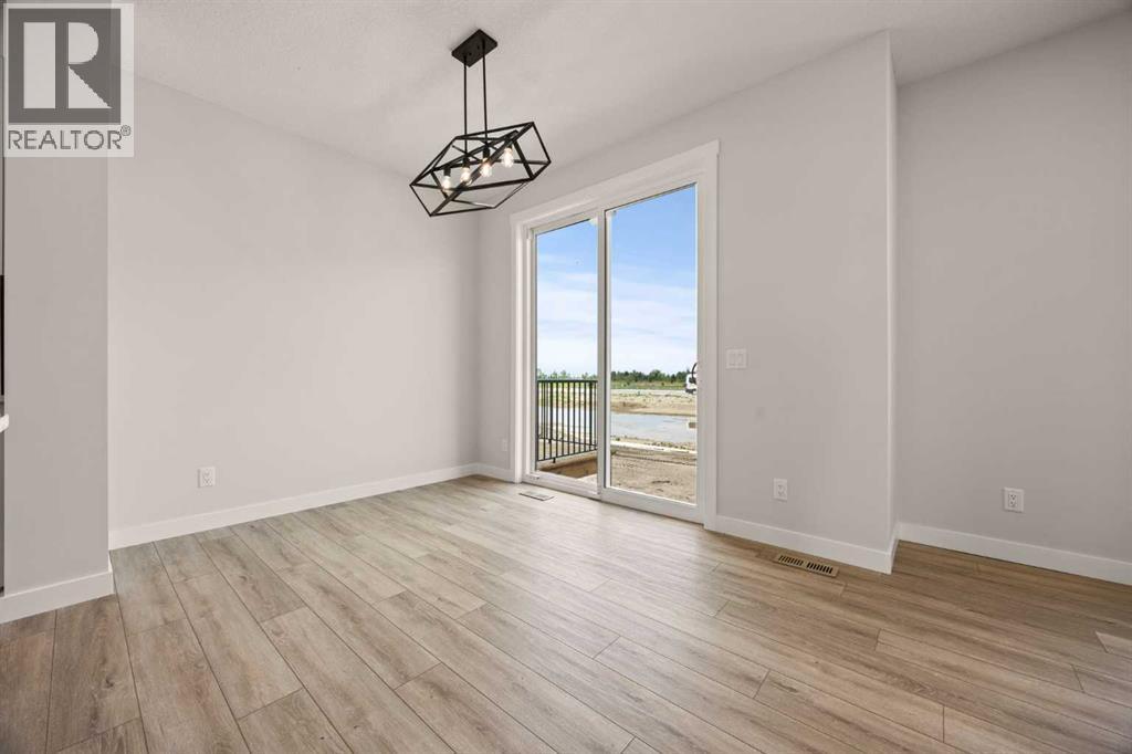 447 Kinniburgh Loop, Chestermere, Alberta  T1X 3C2 - Photo 21 - A2281154
