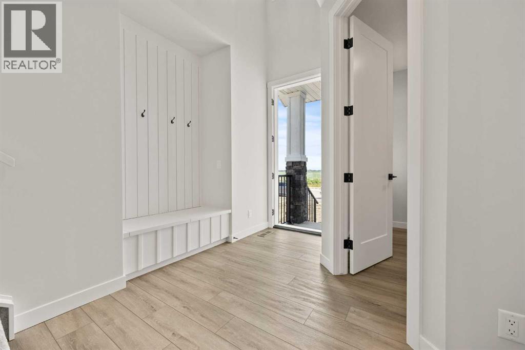 447 Kinniburgh Loop, Chestermere, Alberta  T1X 3C2 - Photo 7 - A2281154