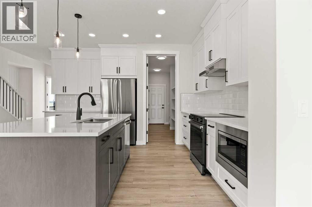 447 Kinniburgh Loop, Chestermere, Alberta  T1X 3C2 - Photo 10 - A2281154