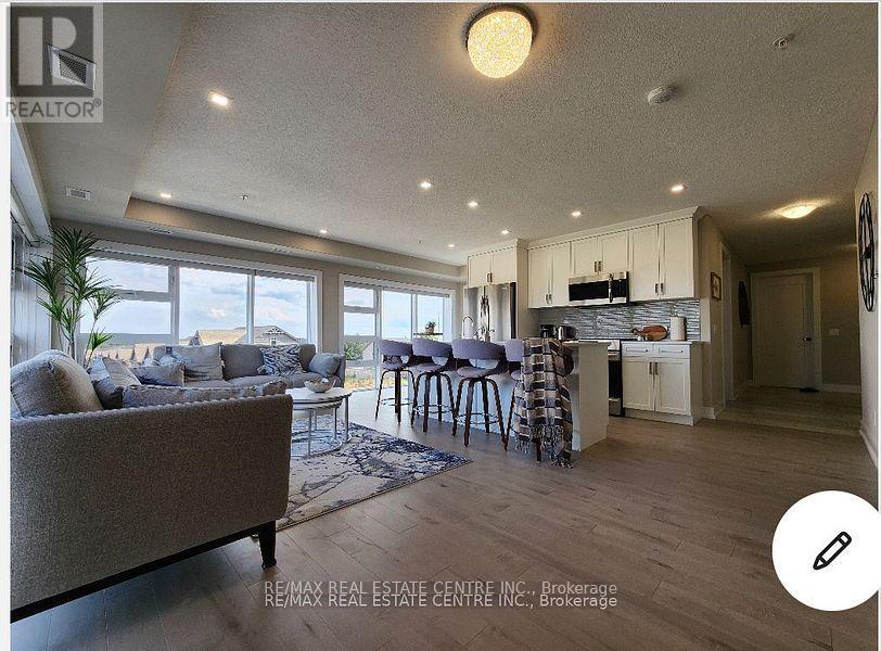 305 - 105 Spencer Avenue, Orangeville, Ontario L9W 7S3 - Photo 4 - W12722758