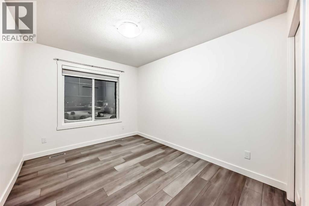 1449 Bayview Point Sw, Airdrie, Alberta  T4B 3N8 - Photo 18 - A2276196