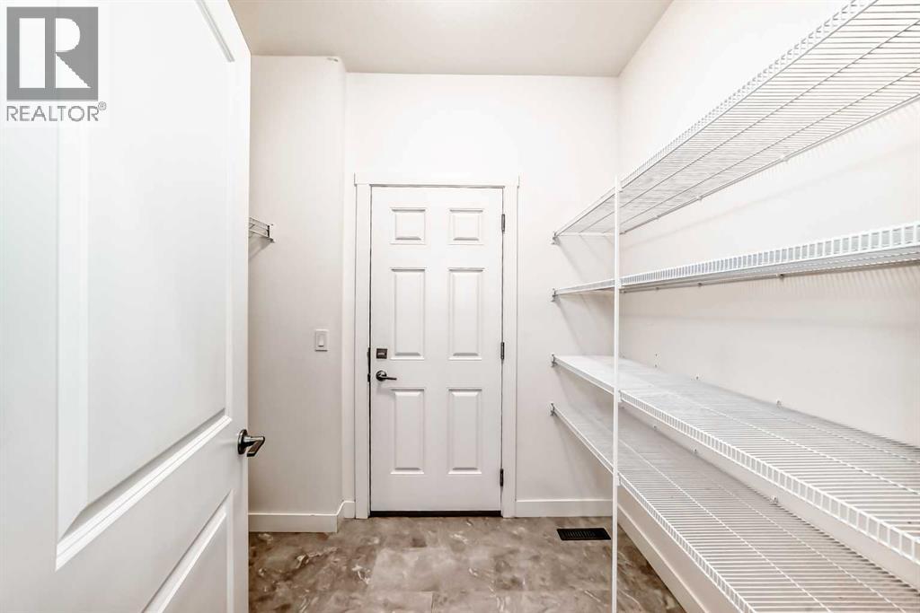 1449 Bayview Point Sw, Airdrie, Alberta  T4B 3N8 - Photo 13 - A2276196