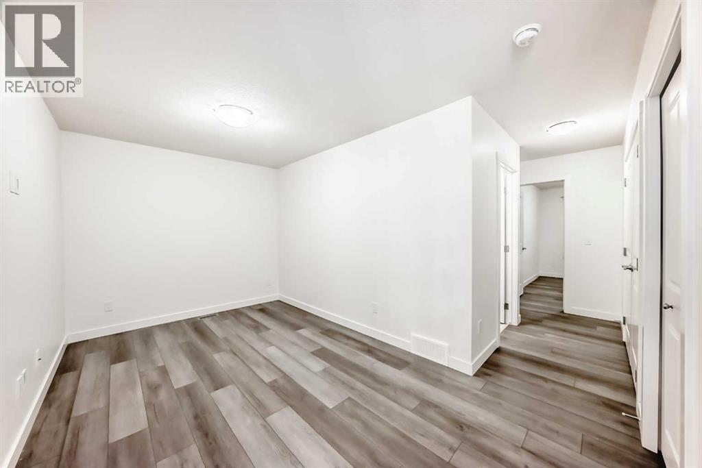 1449 Bayview Point Sw, Airdrie, Alberta  T4B 3N8 - Photo 24 - A2276196