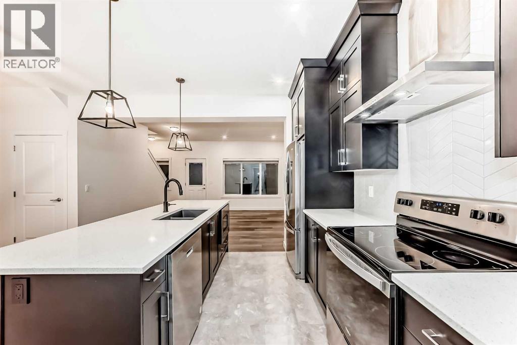 1449 Bayview Point Sw, Airdrie, Alberta  T4B 3N8 - Photo 5 - A2276196