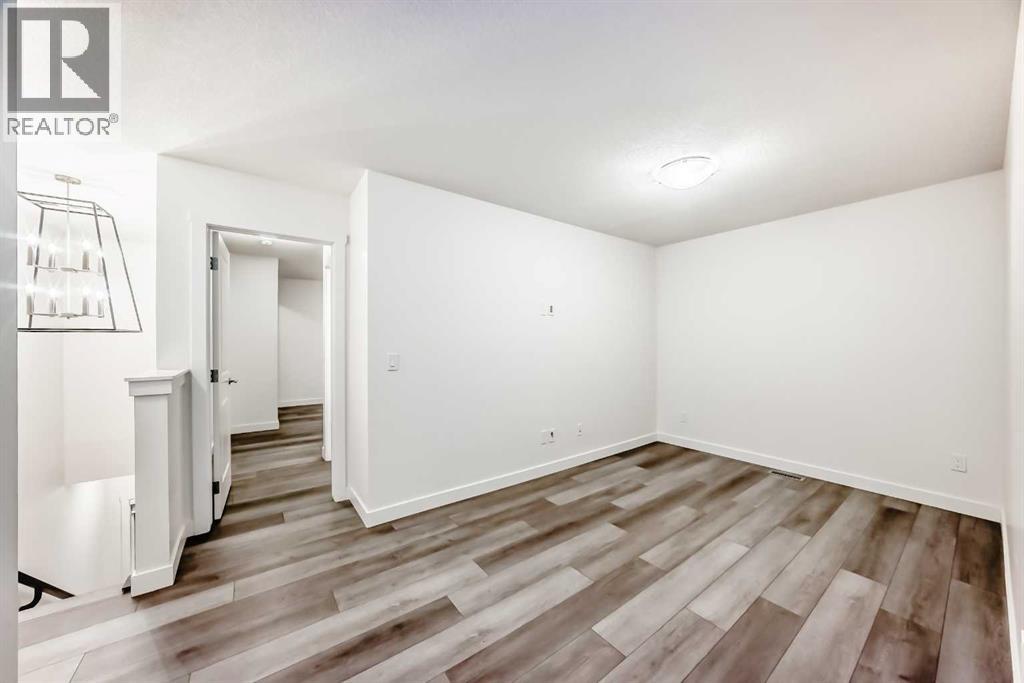 1449 Bayview Point Sw, Airdrie, Alberta  T4B 3N8 - Photo 25 - A2276196