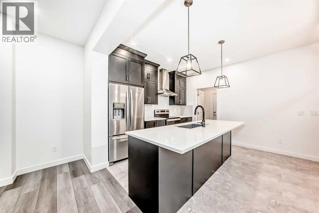 1449 Bayview Point Sw, Airdrie, Alberta  T4B 3N8 - Photo 3 - A2276196