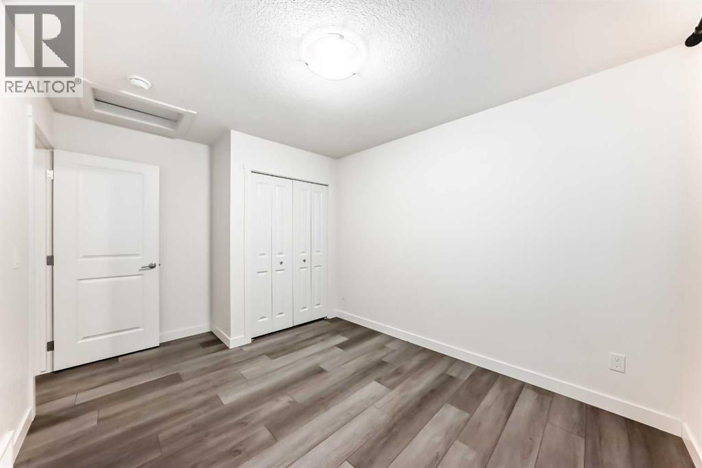 1449 Bayview Point Sw, Airdrie, Alberta  T4B 3N8 - Photo 22 - A2276196