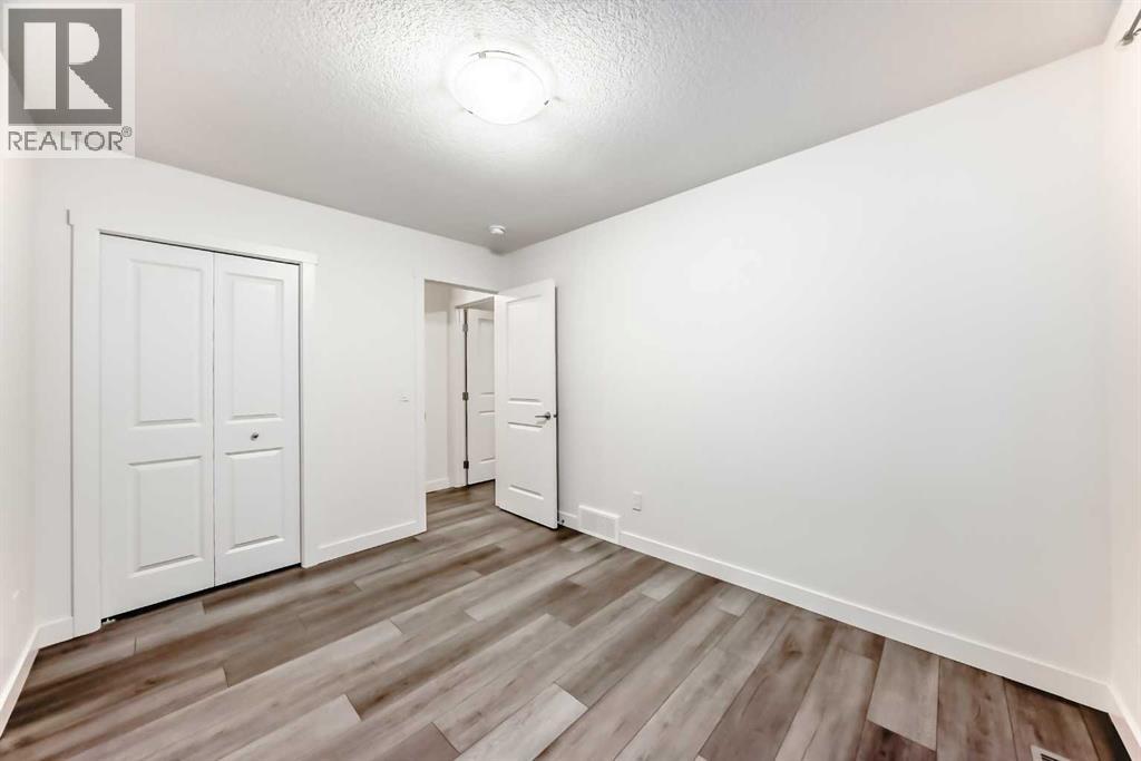 1449 Bayview Point Sw, Airdrie, Alberta  T4B 3N8 - Photo 19 - A2276196