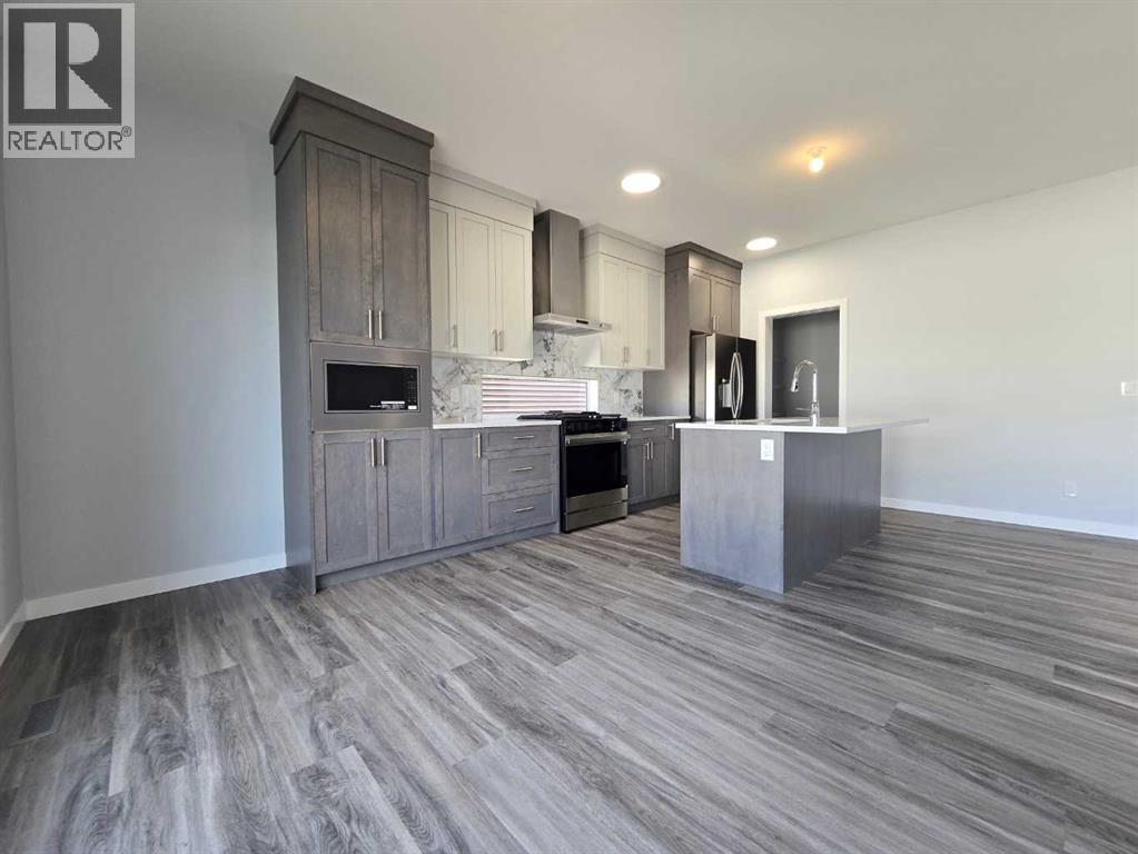 512 Baywater Manor Sw, Airdrie, Alberta  T4B 5R5 - Photo 12 - A2269934