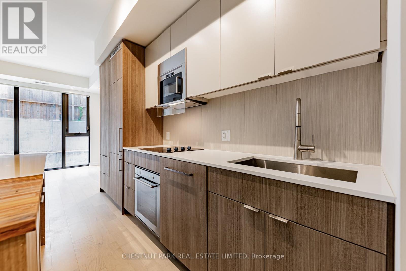 203 - 840 St Clair Avenue W, Toronto, Ontario  M6C 0A4 - Photo 6 - C12723052