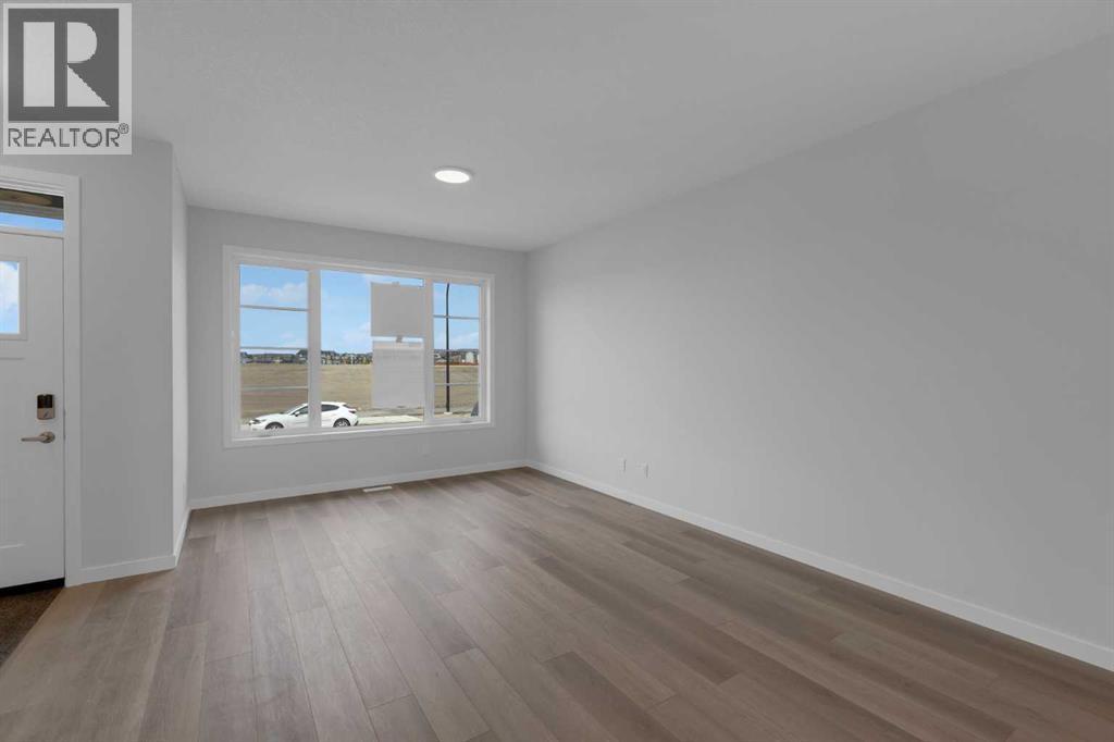 567 Carrington Boulevard Nw, Calgary, Alberta  T3P 2L8 - Photo 3 - A2262600