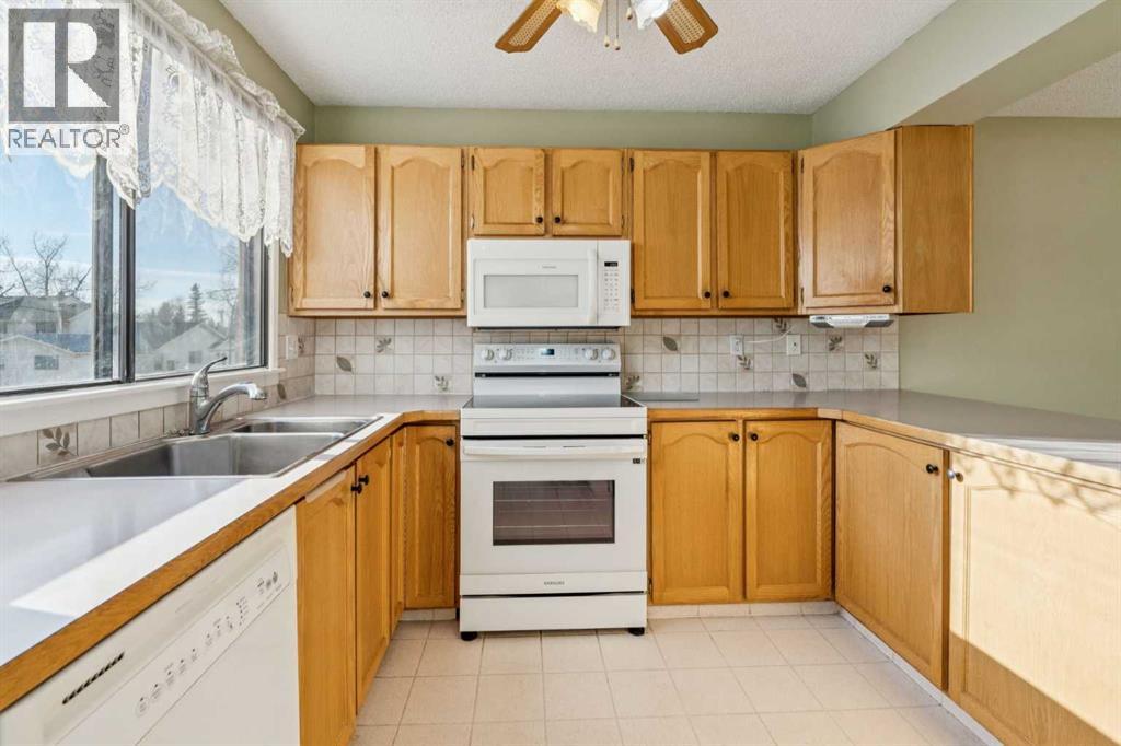 308 Woodvale Crescent Sw, Calgary, Alberta  T2W 3P3 - Photo 14 - A2280162