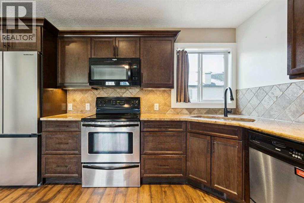 1072 Channelside Drive Sw, Airdrie, Alberta  T4B 3K4 - Photo 36 - A2277878