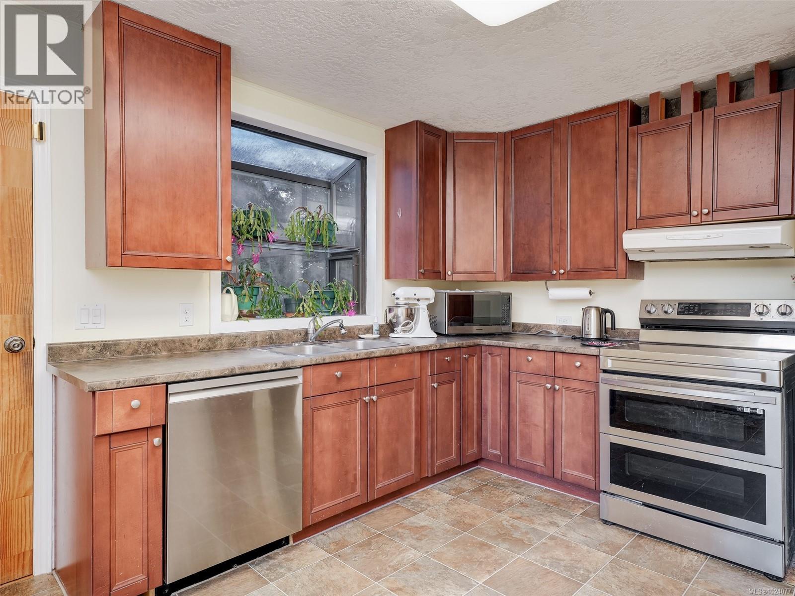 668 Charmar Cres, Langford, British Columbia  V9B 5W2 - Photo 6 - 1024077