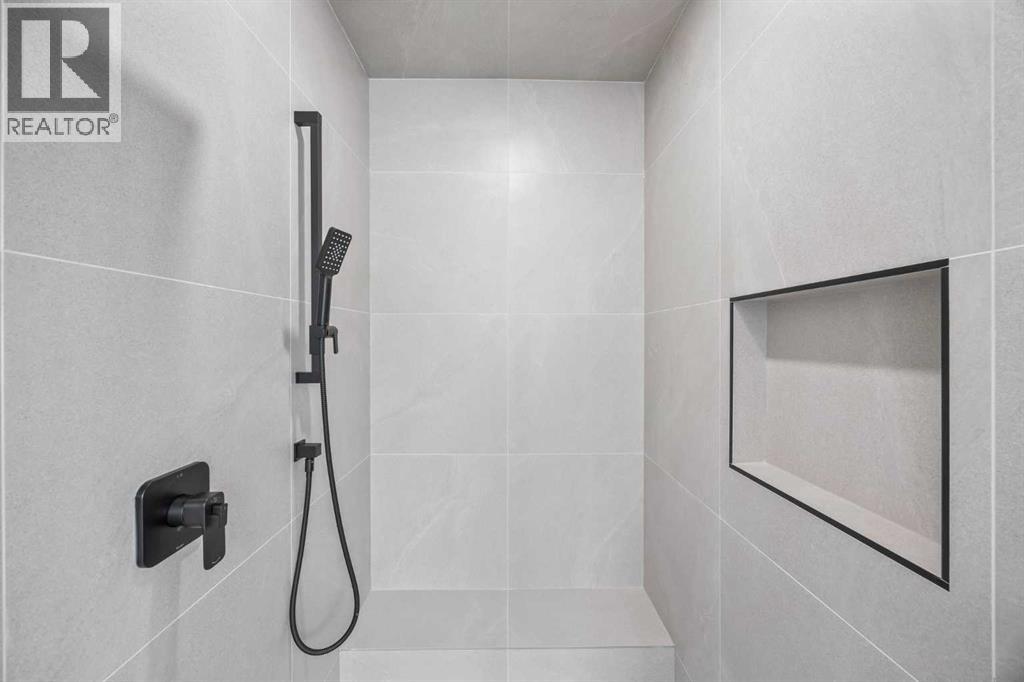 9 Eaton Terrace, Rural Rocky View County, Alberta  T1Z 0A1 - Photo 34 - A2276755