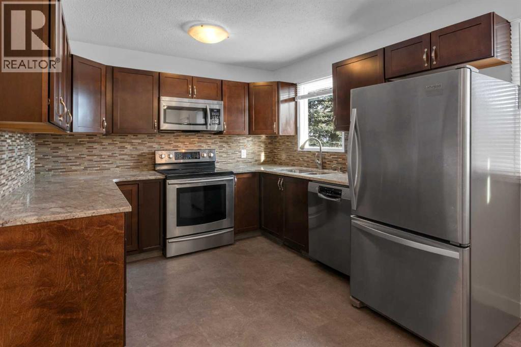 6312 Thorncliffe Drive Nw, Calgary, Alberta  T2K 3A7 - Photo 6 - A2278293
