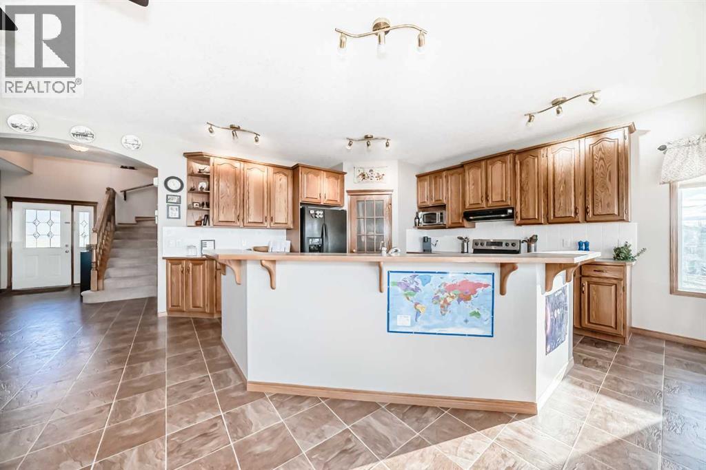 114 Royal Birkdale Crescent Nw, Calgary, Alberta  T3G 5R6 - Photo 5 - A2279052