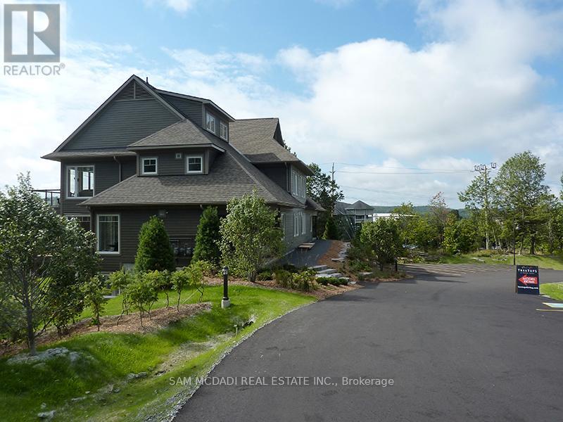102 - 2 Tree Tops Lane, Huntsville, Ontario  P1H 0B8 - Photo 3 - X12724694