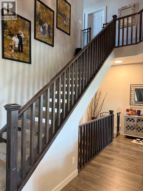 325 Kinniburgh Cove, Chestermere, Alberta  T1X 0Y7 - Photo 4 - A2281235