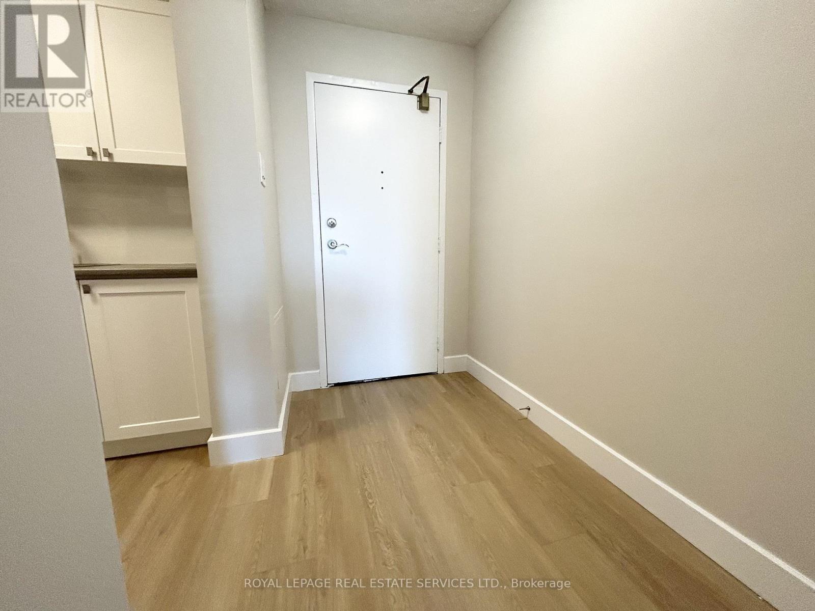 1010 - 82 Millside Drive, Milton, Ontario  L9T 4A1 - Photo 3 - W12724934