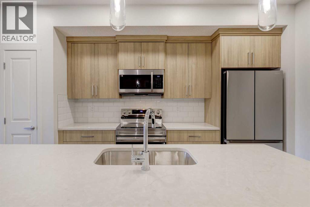 119, 245 Edith Place Nw, Calgary, Alberta  T3R 2C9 - Photo 6 - A2275307