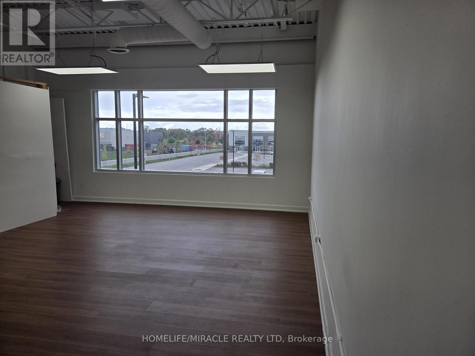 214 - 3495 Rebecca Street, Oakville, Ontario  L6L 0H5 - Photo 3 - W12726166