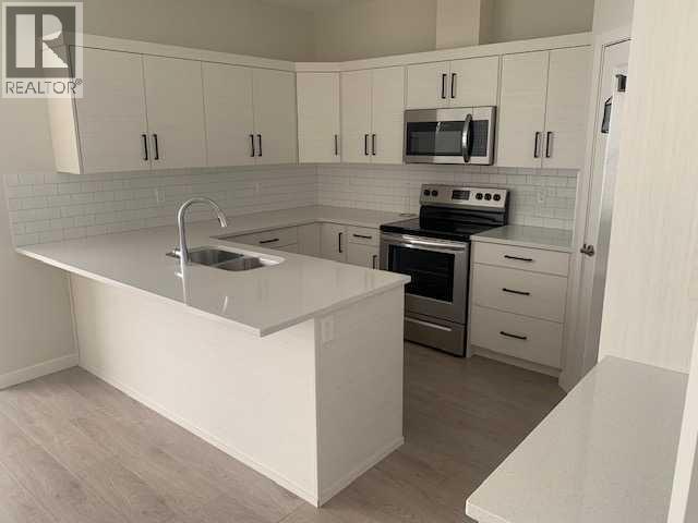 1, 971 40 Avenue N, Lethbridge, Alberta  T1H 6B7 - Photo 6 - A2281447