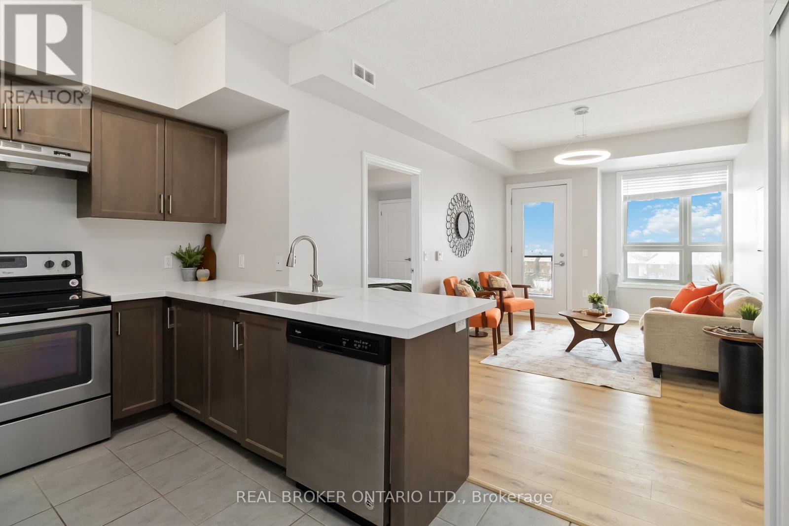 421 - 640 Sauve Street, Milton, Ontario  L9T 7E3 - Photo 1 - W12726486