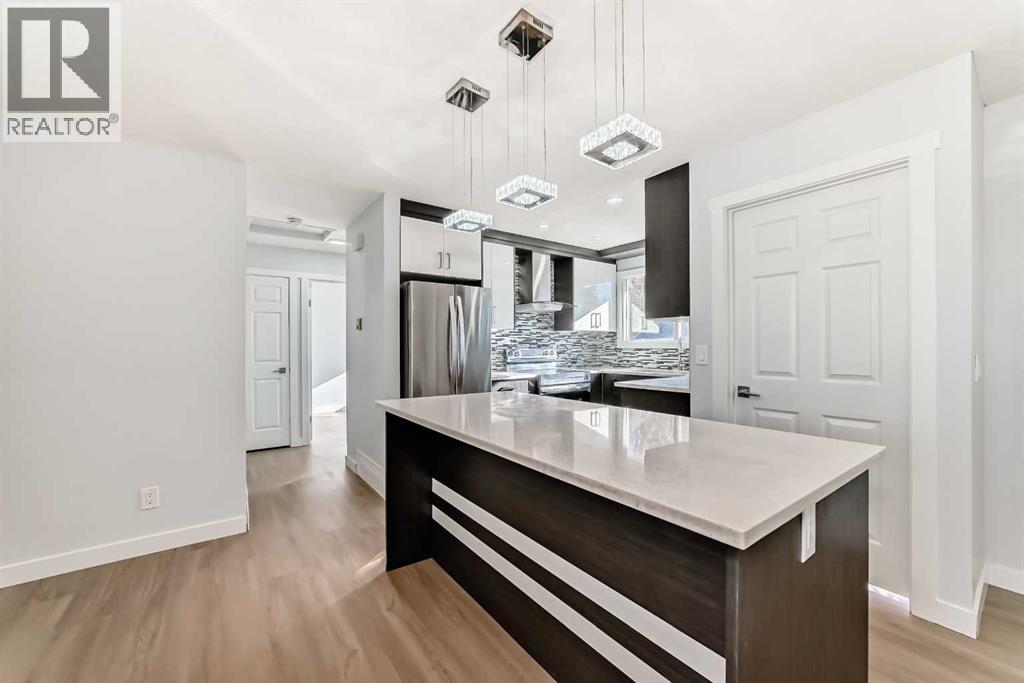 207 Pinecliff Way Ne, Calgary, Alberta  T1Y 3X4 - Photo 5 - A2277456