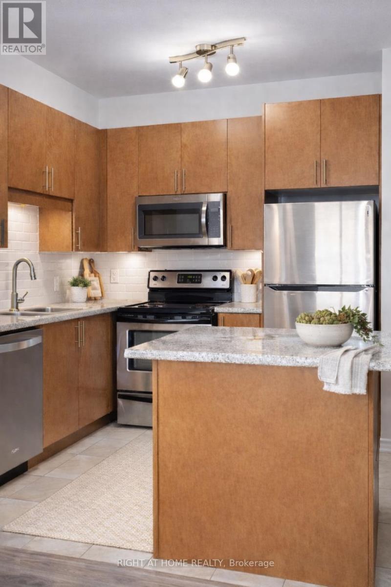 1003 - 133 Wynford Drive, Toronto, Ontario  M3C 0J5 - Photo 2 - C12726746