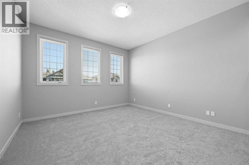 229 Bridlerange Place Sw, Calgary, Alberta  T2Y 0K8 - Photo 20 - A2281020