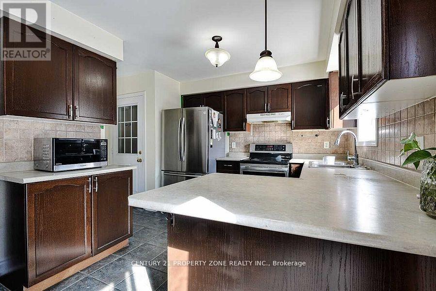 84 Tideland Drive, Brampton, Ontario  L7A 2W1 - Photo 3 - W12648924